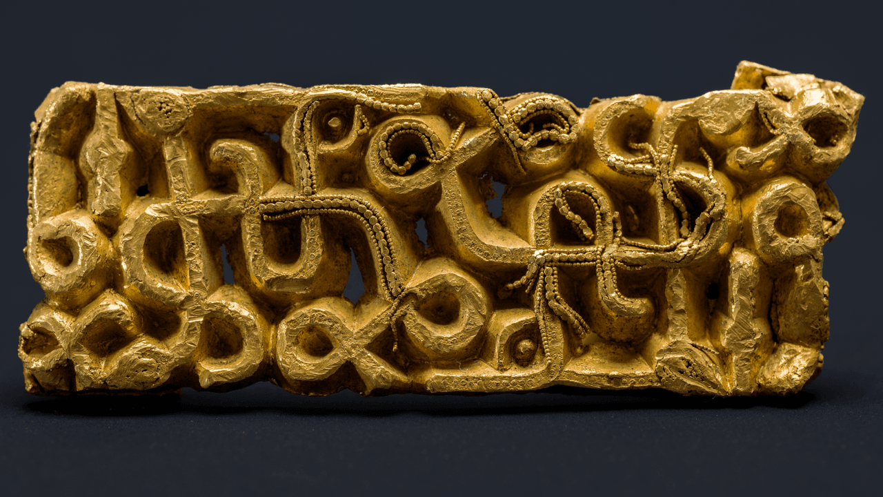  Gold sword scabbard discovered under toppled tree in Norway was likely 'sacrificed' by an elite warrior 1,500 years ago 