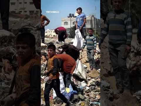 Gaza’s children survive by scavenging through garbage
