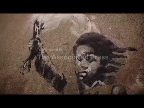 Banksy's 'The Migrant Child' unveiled after restoration, tours Venice canals
