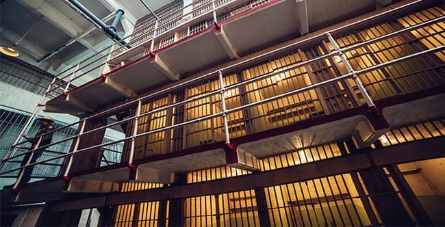 Five-Time Felon Allegedly Ran COVID-19 Unemployment Scam Using Inmates' Identities