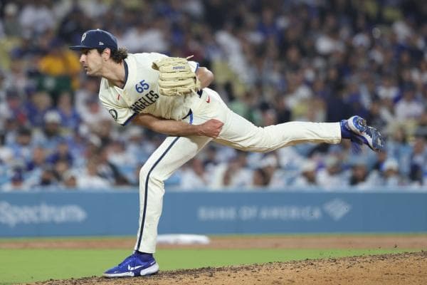 Dodgers adjust pitching staff again, recall RHP Wyatt Mills