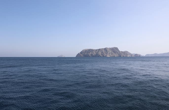 US attacks Iranian vessels near Omani port, blockade continues
