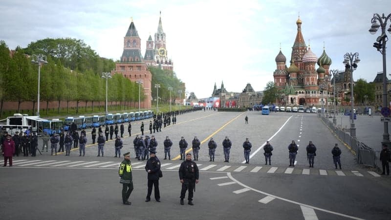 Russia holds scaled-back parade amid further truce calls
