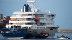Spain starts evacuating virus-hit cruise ship in Tenerife