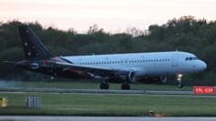 Plane carrying passengers from cruise ship hit by virus lands in UK