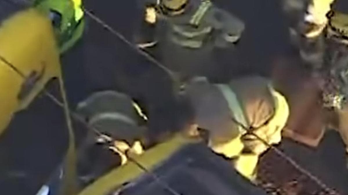 Boy trapped under train at North Melbourne station