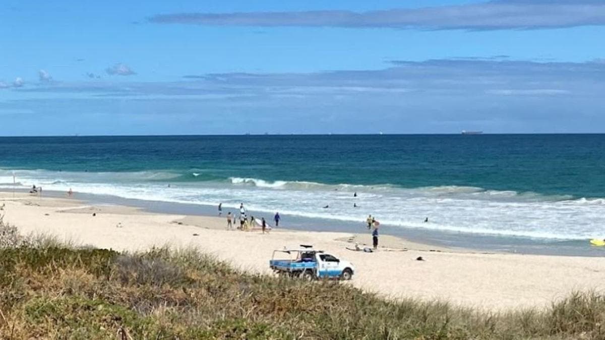 Rescuers desperately search for missing swimmer spotted in distress before vanishing at Trigg Beach