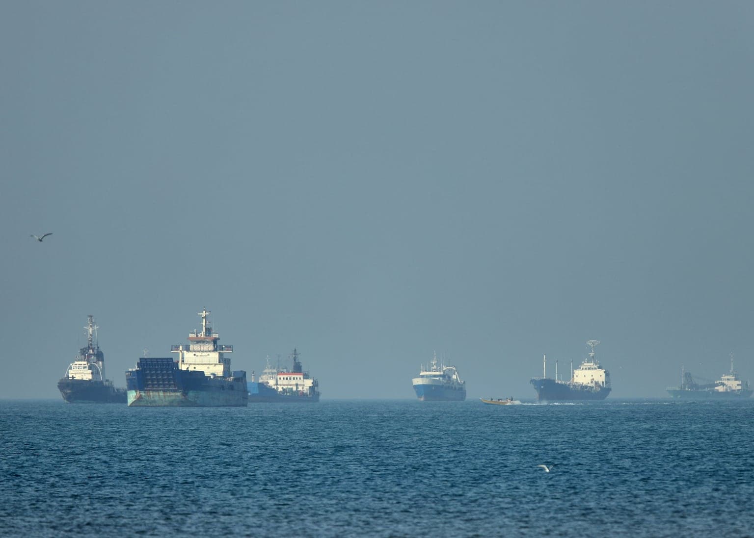 Iran warns US against attacks on its ships as ceasefire appears to hold